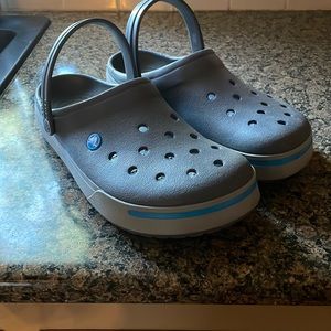 Mens Crocs in gray with blue trim size 11.Shoes were worn once.